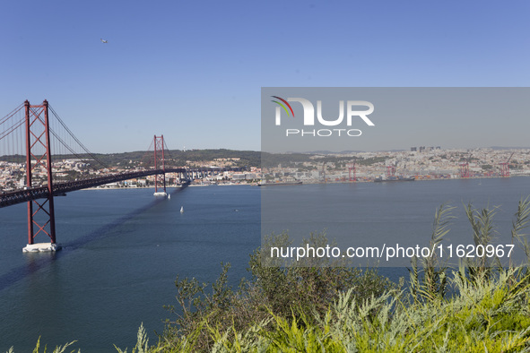 A general view of the 25 de Abril Bridge in Lisbon, Portugal, on September 29, 2024. Cristo Rei attracts pilgrims, tourists, and visitors fr...