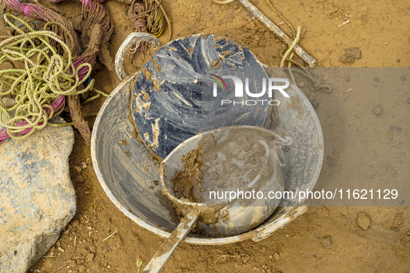 People's daily lives are affected after heavy rainfall and flooding of the Nakhu River in Lalitpur, Nepal, on September 29, 2024. 