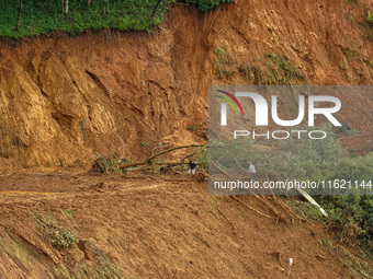 There are roadblocks on Charghare caused by landslides due to heavy rainfall in southern Lalitpur, Nepal, on September 29, 2024. (