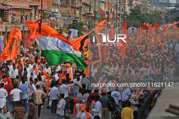 Yuva Shakti Manch activists participate in a 'Bhagva' rally demanding a Hindu Nation, Uniform Civil Code (UCC), and Population Control Act i...