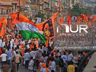 Yuva Shakti Manch activists participate in a 'Bhagva' rally demanding a Hindu Nation, Uniform Civil Code (UCC), and Population Control Act i...