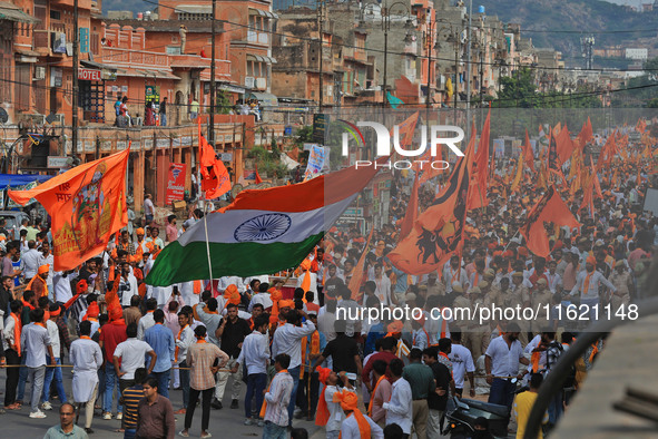 Yuva Shakti Manch activists participate in a 'Bhagva' rally demanding a Hindu Nation, Uniform Civil Code (UCC), and Population Control Act i...