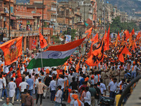 Yuva Shakti Manch activists participate in a 'Bhagva' rally demanding a Hindu Nation, Uniform Civil Code (UCC), and Population Control Act i...