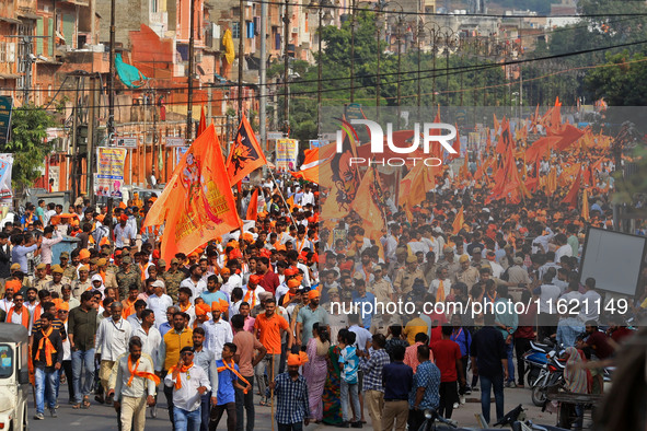 Yuva Shakti Manch activists participate in a 'Bhagva' rally demanding a Hindu Nation, Uniform Civil Code (UCC), and Population Control Act i...