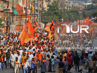 Yuva Shakti Manch activists participate in a 'Bhagva' rally demanding a Hindu Nation, Uniform Civil Code (UCC), and Population Control Act i...