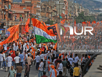 Yuva Shakti Manch activists participate in a 'Bhagva' rally demanding a Hindu Nation, Uniform Civil Code (UCC), and Population Control Act i...