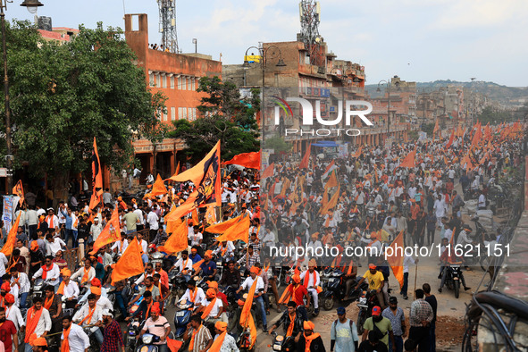 Yuva Shakti Manch activists participate in a 'Bhagva' rally demanding a Hindu Nation, Uniform Civil Code (UCC), and Population Control Act i...