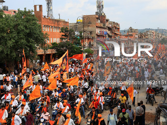 Yuva Shakti Manch activists participate in a 'Bhagva' rally demanding a Hindu Nation, Uniform Civil Code (UCC), and Population Control Act i...