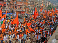 Yuva Shakti Manch activists participate in a 'Bhagva' rally demanding a Hindu Nation, Uniform Civil Code (UCC), and Population Control Act i...