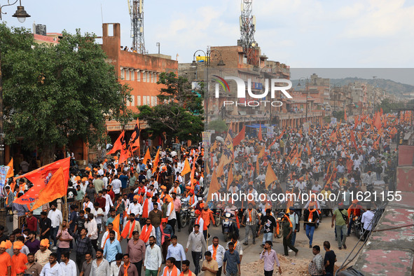 Yuva Shakti Manch activists participate in a 'Bhagva' rally demanding a Hindu Nation, Uniform Civil Code (UCC), and Population Control Act i...