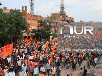 Yuva Shakti Manch activists participate in a 'Bhagva' rally demanding a Hindu Nation, Uniform Civil Code (UCC), and Population Control Act i...