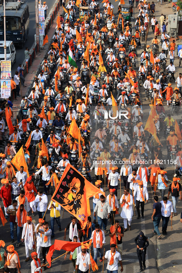 Yuva Shakti Manch activists participate in a 'Bhagva' rally demanding a Hindu Nation, Uniform Civil Code (UCC), and Population Control Act i...