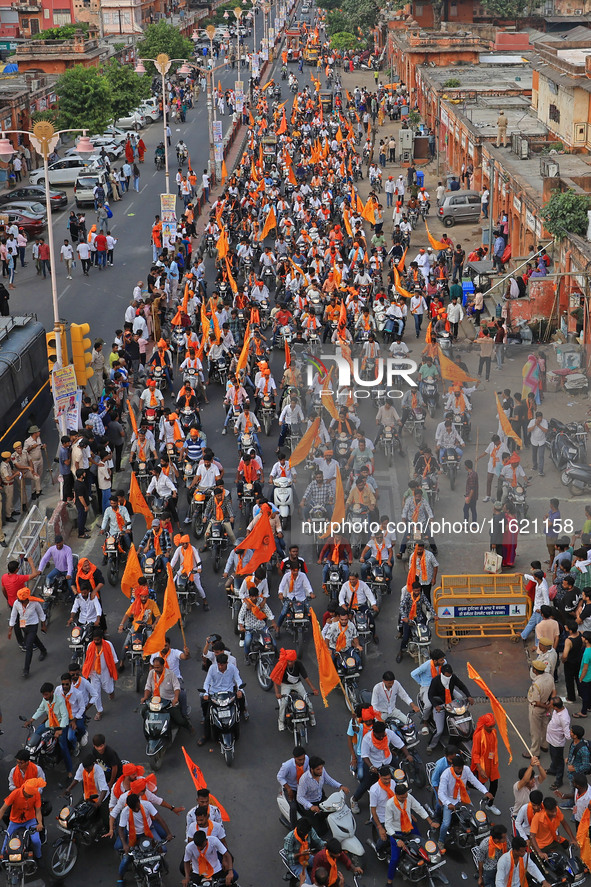 Yuva Shakti Manch activists participate in a 'Bhagva' rally demanding a Hindu Nation, Uniform Civil Code (UCC), and Population Control Act i...