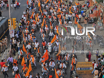 Yuva Shakti Manch activists participate in a 'Bhagva' rally demanding a Hindu Nation, Uniform Civil Code (UCC), and Population Control Act i...