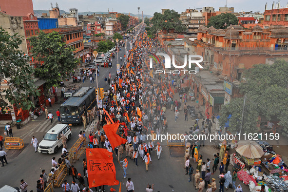 Yuva Shakti Manch activists participate in a 'Bhagva' rally demanding a Hindu Nation, Uniform Civil Code (UCC), and Population Control Act i...