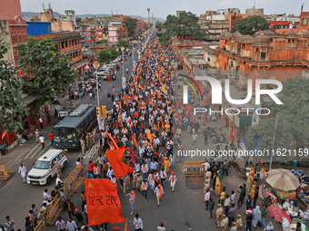 Yuva Shakti Manch activists participate in a 'Bhagva' rally demanding a Hindu Nation, Uniform Civil Code (UCC), and Population Control Act i...