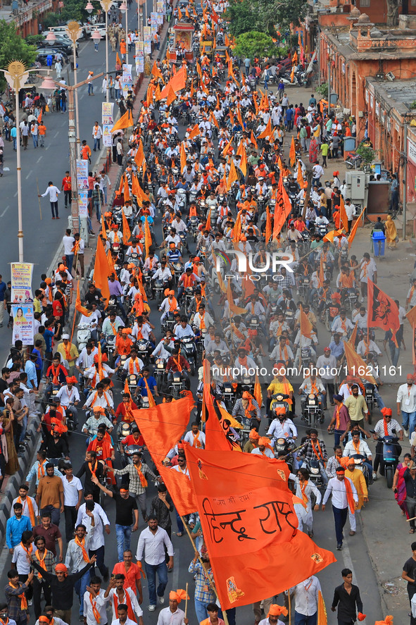 Yuva Shakti Manch activists participate in a 'Bhagva' rally demanding a Hindu Nation, Uniform Civil Code (UCC), and Population Control Act i...