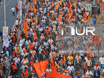 Yuva Shakti Manch activists participate in a 'Bhagva' rally demanding a Hindu Nation, Uniform Civil Code (UCC), and Population Control Act i...