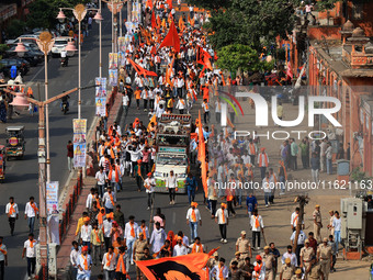 Yuva Shakti Manch activists participate in a 'Bhagva' rally demanding a Hindu Nation, Uniform Civil Code (UCC), and Population Control Act i...