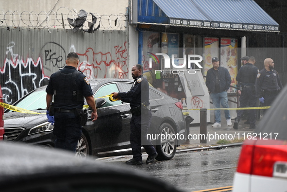 NYPD and EMS are at the scene where a 29-year-old man is fatally shot in the head at East 182nd Street and Mapes Avenue in Bronx, New York,...