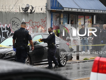 NYPD and EMS are at the scene where a 29-year-old man is fatally shot in the head at East 182nd Street and Mapes Avenue in Bronx, New York,...