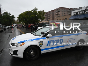 NYPD and EMS are at the scene where a 29-year-old man is fatally shot in the head at East 182nd Street and Mapes Avenue in Bronx, New York,...