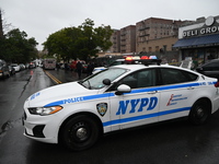 NYPD and EMS are at the scene where a 29-year-old man is fatally shot in the head at East 182nd Street and Mapes Avenue in Bronx, New York,...