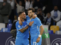 Napoli's Khvicha Kvaratskhelia and Napoli's Matteo Politano celebrate after scoring their first goal during the Serie A soccer match SSC Nap...