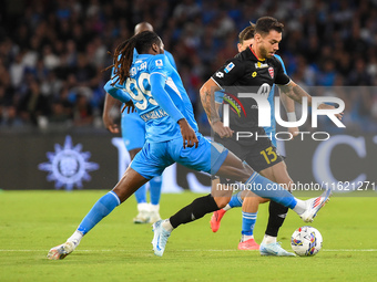 Pedro Pereira of AC Monza competes for the ball with Andre-Frank Zambo Anguissa of SSC Napoli during the Serie A match between SSC Napoli an...