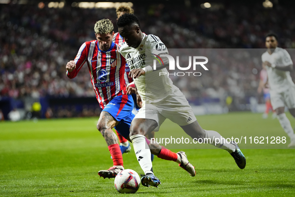 Vinicius Junior left winger of Real Madrid and Brazil and Rodrigo de Paul central midfield of Atletico de Madrid and Argentina and Spaincomp...