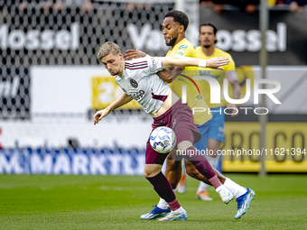 AFC Ajax Amsterdam midfielder Kenneth Taylor and RKC player Denilho Cleonise during the match RKC - Ajax at the Mandemakers Stadium for the...