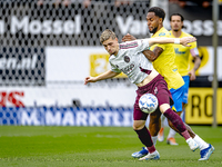 AFC Ajax Amsterdam midfielder Kenneth Taylor and RKC player Denilho Cleonise during the match RKC - Ajax at the Mandemakers Stadium for the...