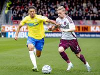 RKC player Daouda Weidmann and AFC Ajax Amsterdam midfielder Kenneth Taylor during the match RKC - Ajax at the Mandemakers Stadium for the D...