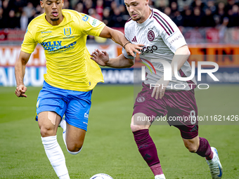 RKC player Daouda Weidmann and AFC Ajax Amsterdam midfielder Kenneth Taylor during the match RKC - Ajax at the Mandemakers Stadium for the D...