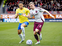 RKC player Daouda Weidmann and AFC Ajax Amsterdam midfielder Kenneth Taylor during the match RKC - Ajax at the Mandemakers Stadium for the D...