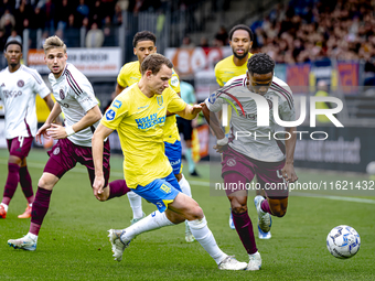 RKC player Julian Lelieveld and AFC Ajax Amsterdam forward Jaydon Banel during the match RKC vs. Ajax at the Mandemakers Stadium for the Dut...