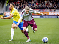 RKC player Daouda Weidmann and AFC Ajax Amsterdam midfielder Kenneth Taylor during the match RKC - Ajax at the Mandemakers Stadium for the D...