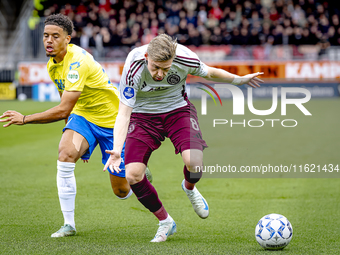 RKC player Daouda Weidmann and AFC Ajax Amsterdam midfielder Kenneth Taylor during the match RKC - Ajax at the Mandemakers Stadium for the D...