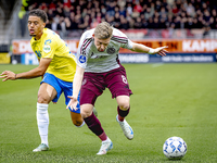 RKC player Daouda Weidmann and AFC Ajax Amsterdam midfielder Kenneth Taylor during the match RKC - Ajax at the Mandemakers Stadium for the D...