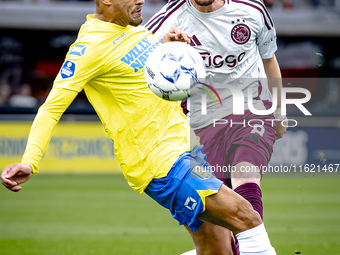 RKC player Liam van Gelderen and AFC Ajax Amsterdam midfielder Kenneth Taylor during the match RKC - Ajax at the Mandemakers Stadium for the...