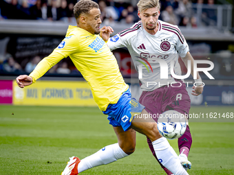 RKC player Liam van Gelderen and AFC Ajax Amsterdam midfielder Kenneth Taylor during the match RKC - Ajax at the Mandemakers Stadium for the...