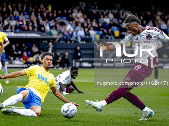 RKC player Daouda Weidmann and AFC Ajax Amsterdam forward Jaydon Banel during the match RKC vs. Ajax at the Mandemakers Stadium for the Dutc...