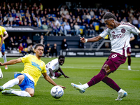 RKC player Daouda Weidmann and AFC Ajax Amsterdam forward Jaydon Banel during the match RKC vs. Ajax at the Mandemakers Stadium for the Dutc...