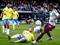 RKC player Daouda Weidmann and AFC Ajax Amsterdam forward Jaydon Banel during the match RKC vs. Ajax at the Mandemakers Stadium for the Dutc...