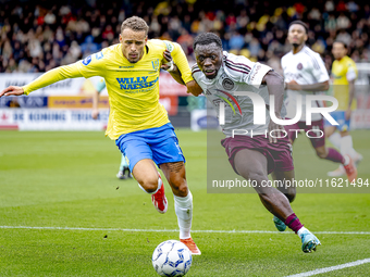 RKC player Liam van Gelderen and AFC Ajax Amsterdam forward Brian Brobbey during the match RKC vs. Ajax at the Mandemakers Stadium for the D...