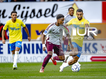 AFC Ajax Amsterdam defender Jorrel Hato and RKC player Yassin Oukili during the match RKC - Ajax at the Mandemakers Stadium for the Dutch Er...