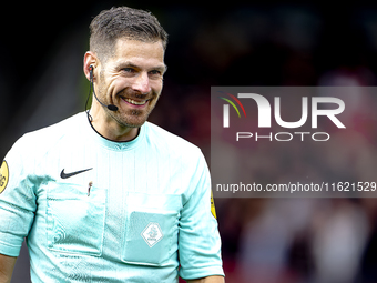 Referee Jochem Kamphuis officiates the match between RKC and Ajax at the Mandemakers Stadium for the Dutch Eredivisie season 2024-2025 in Wa...