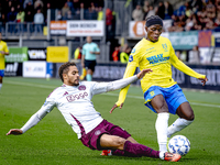 AFC Ajax Amsterdam defender Devyne Rensch and RKC player Chris Lokesa during the match RKC - Ajax at the Mandemakers Stadium for the Dutch E...