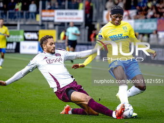 AFC Ajax Amsterdam defender Devyne Rensch and RKC player Chris Lokesa during the match RKC - Ajax at the Mandemakers Stadium for the Dutch E...