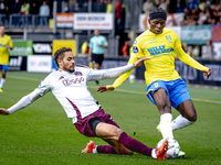 AFC Ajax Amsterdam defender Devyne Rensch and RKC player Chris Lokesa during the match RKC - Ajax at the Mandemakers Stadium for the Dutch E...